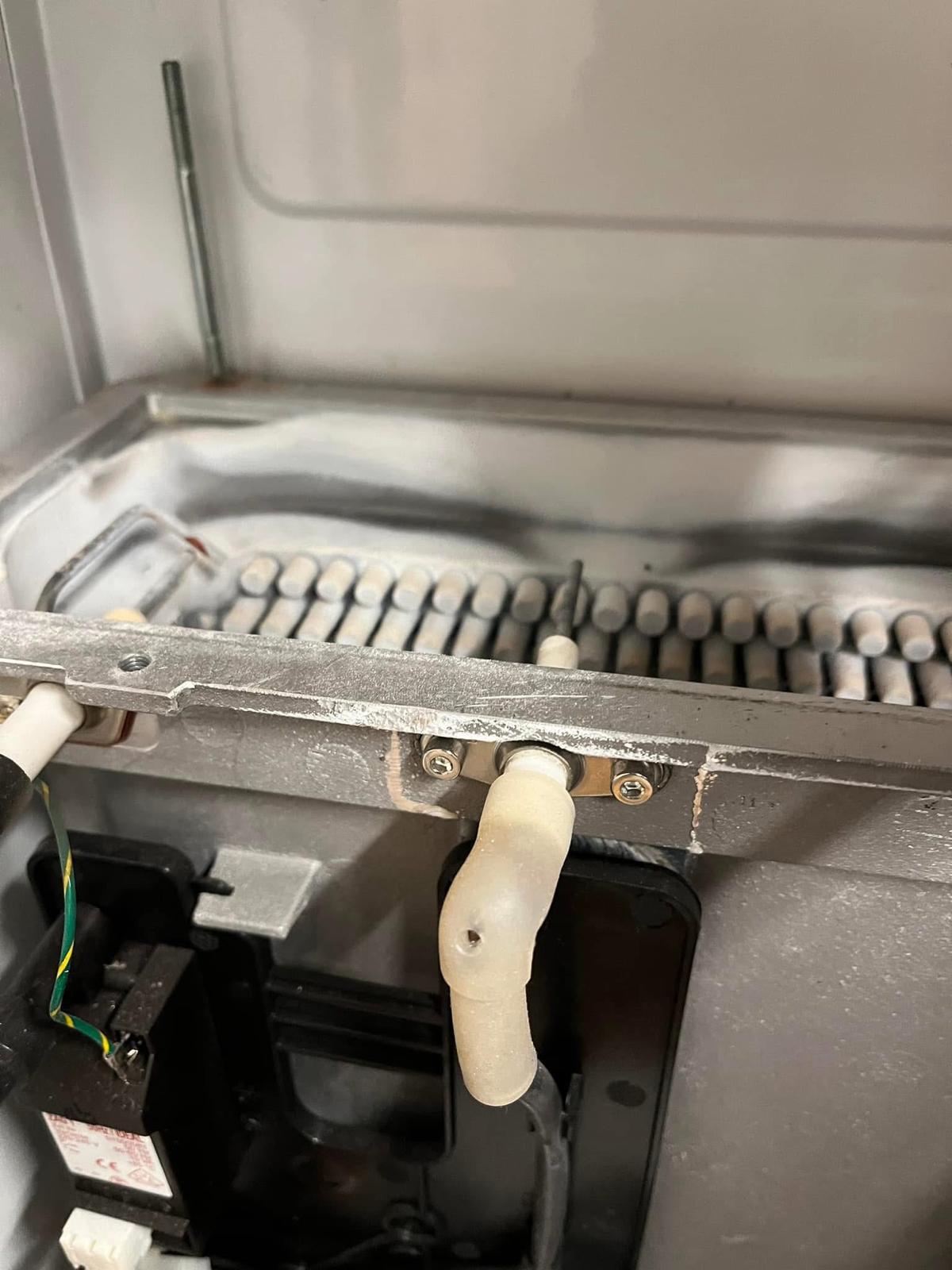 Close-up of boiler burner electrodes during fault investigation
