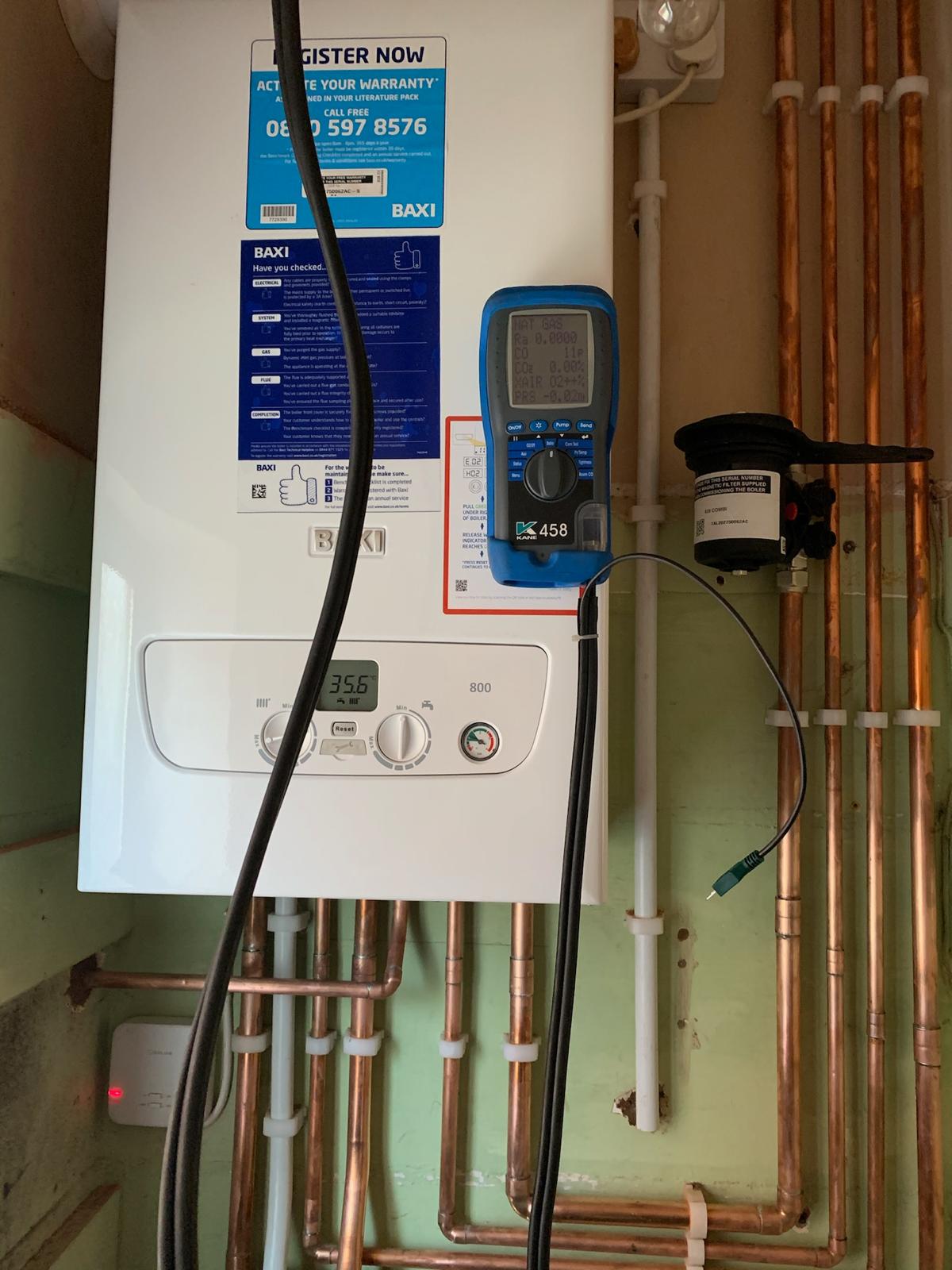Flue gas analyser test during a Gas Safety Certificate check