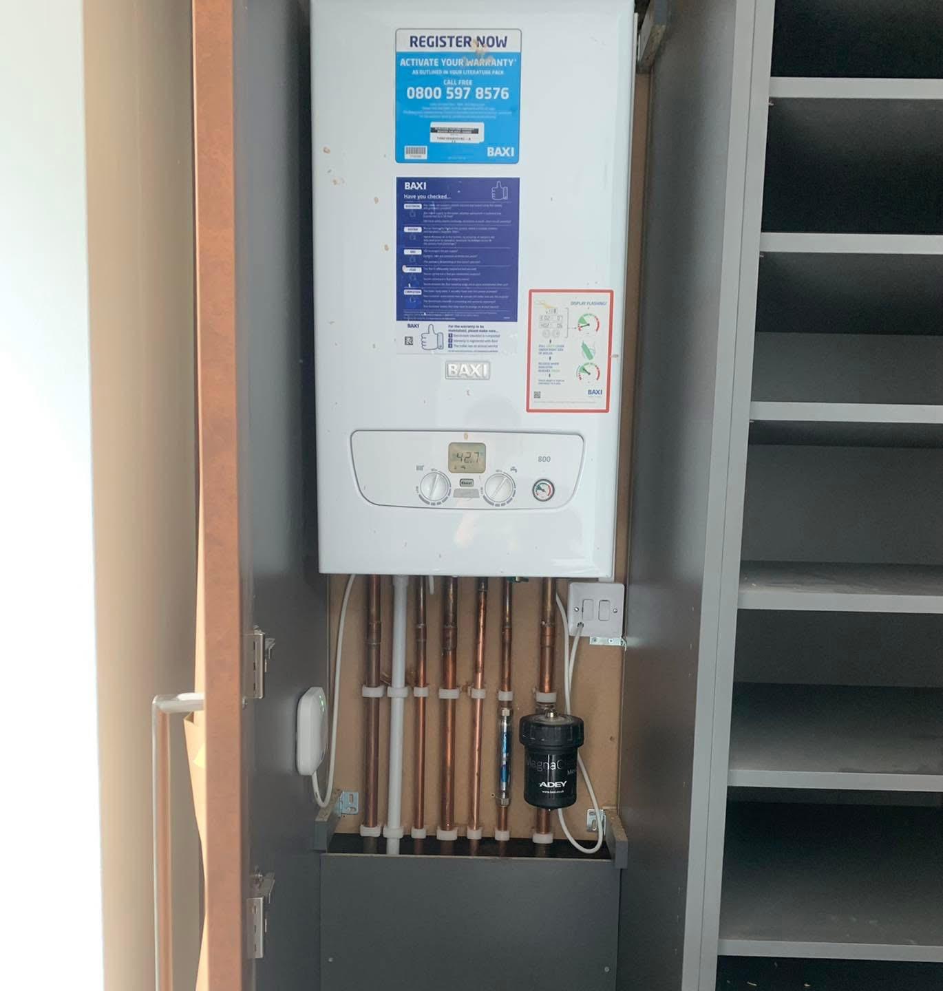 Under-stairs boiler installation with ADEY MagnaClean filter