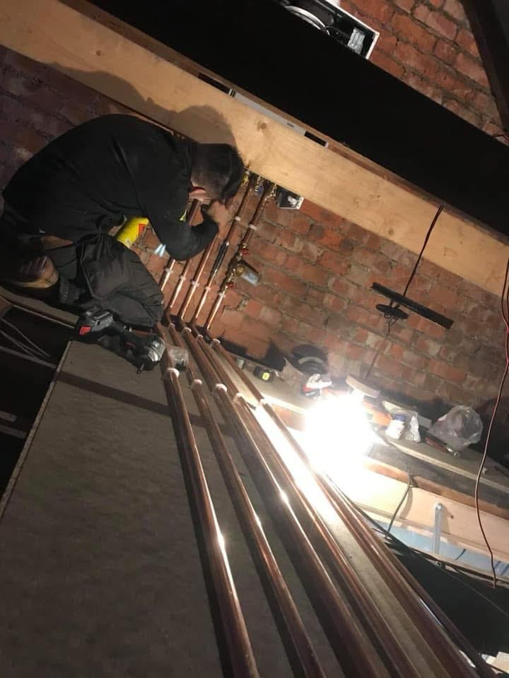 New copper central heating pipework installation in loft
